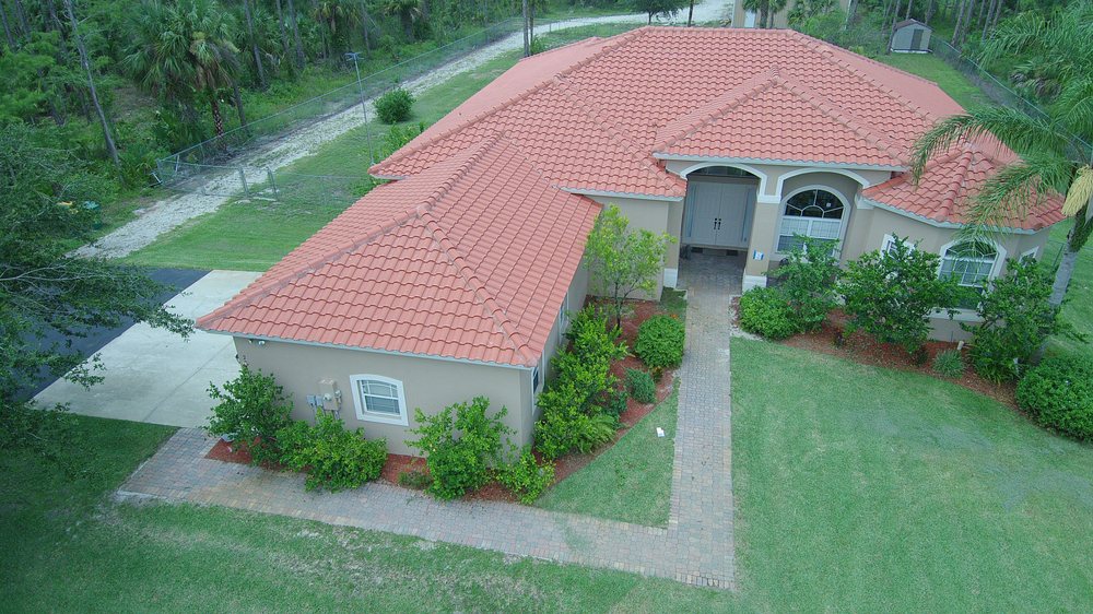 Slide of Estate Roofing
