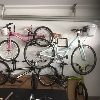 Ready Help - Installation of hanging bike racks in a dry walled garage. - Handyman Near Me Ready Help - Installation of hanging bike racks in a dry walled garage. - Handyman Near Me
