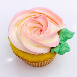 Windy City Baker - Cupcakes topped with two tone piped rose.