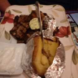 Restaurant Dionysos - Lammkoteletts, Kräuterbutter, Ofenkartoffel, Zaziki