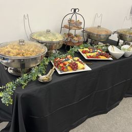 Breakfast buffet - Potatoes, Fruit platter, chilaquiles, chorizo and eggs, chia pudding, Greek vegetables and eggs