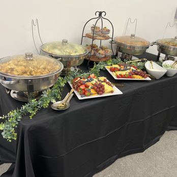 Delicia - Breakfast buffet - Potatoes, Fruit platter, chilaquiles, chorizo and eggs, chia pudding, Greek vegetables and eggs - Caterers Near Me