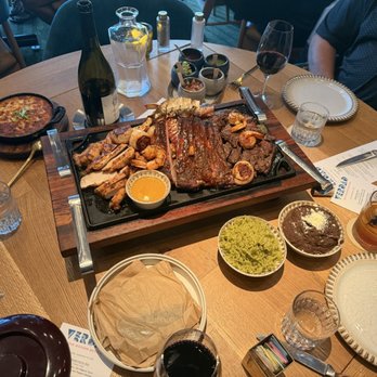 VERDAD True Modern Mexican - Grilled chicken, beef, shrimp, and lobster, bacon-wrapped scallops, rice, salsas, and corn soufflé cake - Mexican Near Me - Austin, Texas VERDAD True Modern Mexican - Grilled chicken, beef, shrimp, and lobster, bacon-wrapped scallops, rice, salsas, and corn soufflé cake - Mexican Near Me - Austin, Texas