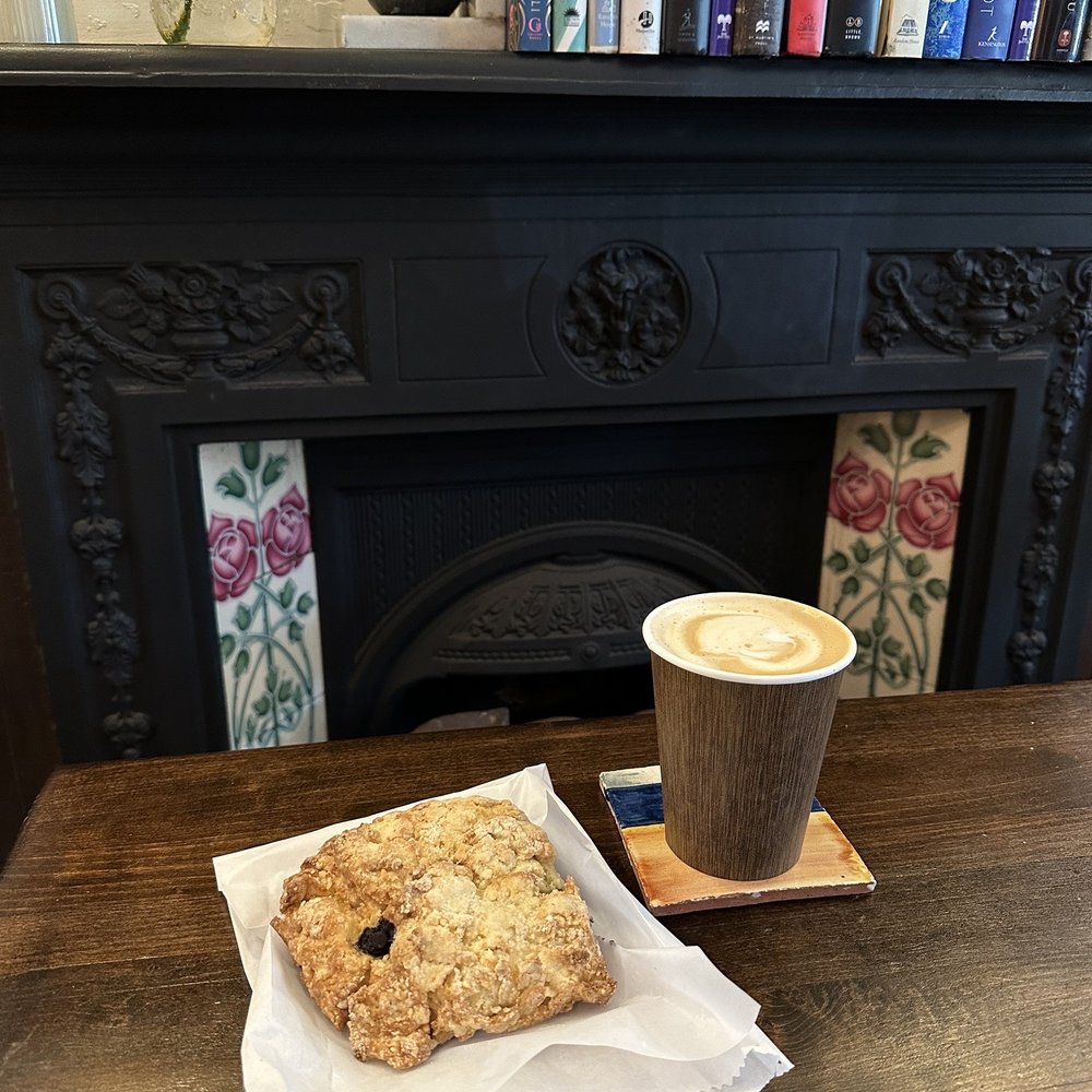Blue Pig Bakery - Blueberry and lemon scone, small latte - IG @bougiefoodieboi - Bakeries Near Me - Newport, Oregon