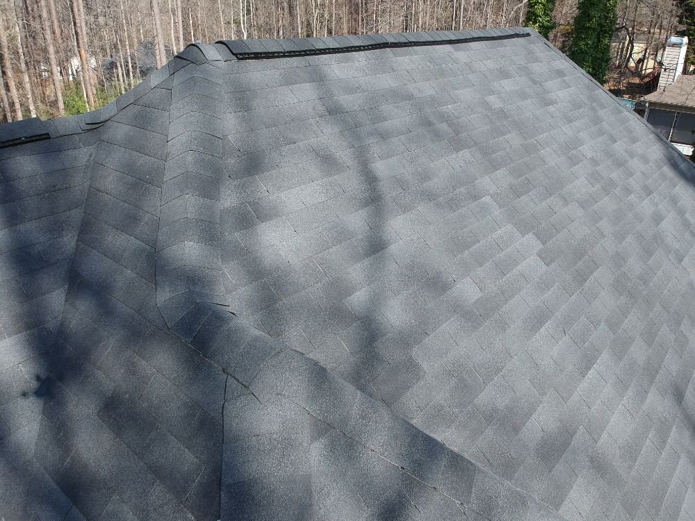 Slide of Mountain Peak Roofing