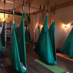 Yoga Tree Wellness Center - Savasana in the supportive Aerial Hammocks!