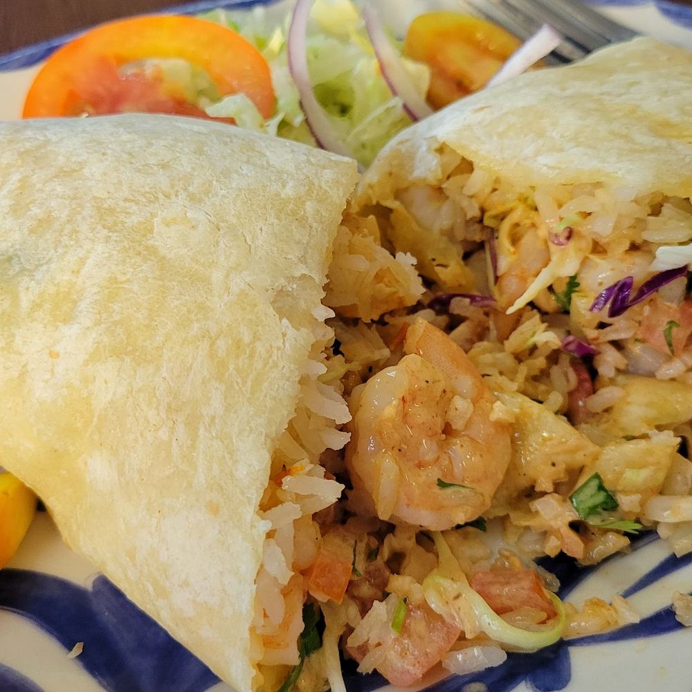 Bahía Grill Cocina Mexicana - Garlic shrimp burrito.  Lots of good tasting rice in there and a pink dressing.  Enjoyed it. - Mexican Near Me - Corona, California