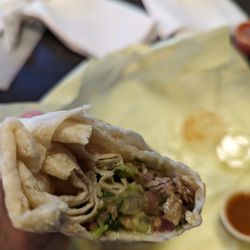 Lourdes - First bite into carne asada burrito