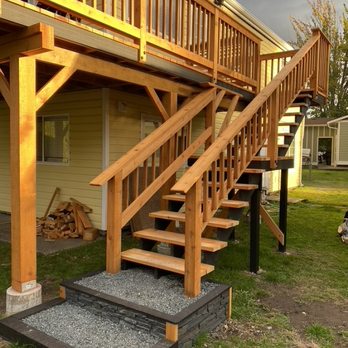 Action Jackson's Contracting - Cedar stairway leading to deck - General Contractors Near Me Action Jackson's Contracting - Cedar stairway leading to deck - General Contractors Near Me