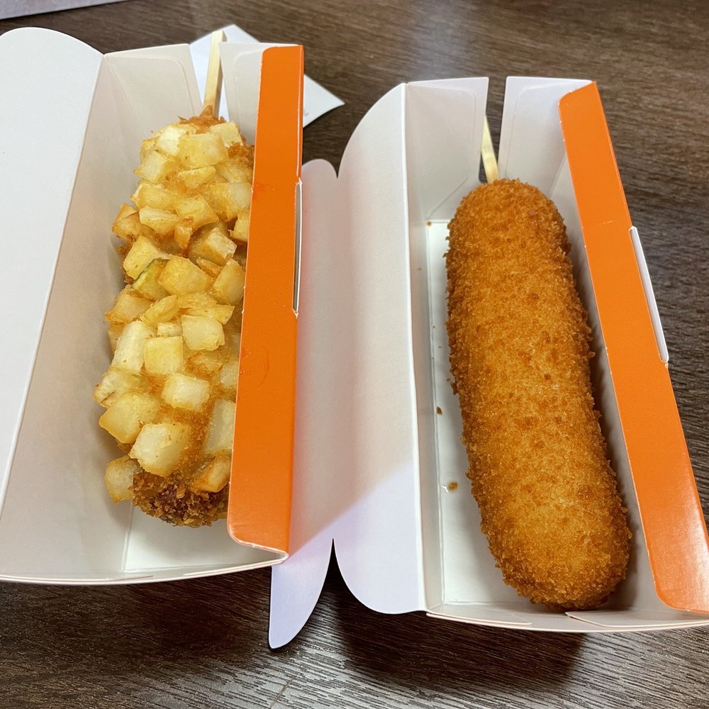 CornDogs By Mr. Cow - Sweet and Savory right Potato chunks with hot dog on a stick left - Hot Dogs Near Me - Ewa Beach, Hawaii