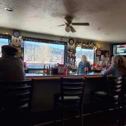 Frazier Park Moose Lodge - Bar with a picture window of the mountains.