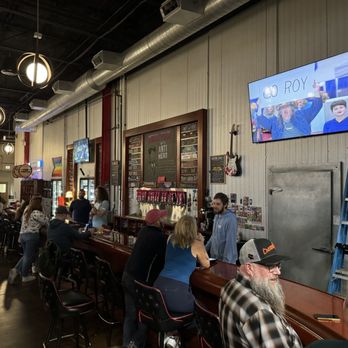 Revolution Brewing - Kedzie Brewery - The bar area with 3 tvs - Breweries Near Me - Chicago, Illinois Revolution Brewing - Kedzie Brewery - The bar area with 3 tvs - Breweries Near Me - Chicago, Illinois