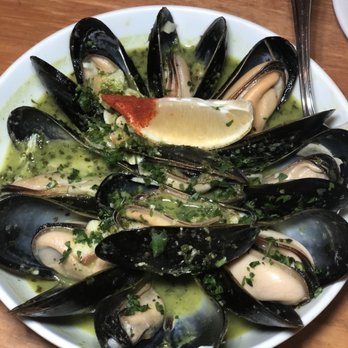 La Boca - MEJILLONS - black mussels in salsa verde , parsley, garlic, spinach, lime, jalapeños. Pro tip: de-shell all your mussels, eat as a soup! - Tapas Bars Near Me - Santa Fe, New Mexico
