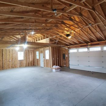 Deck It Out Builders - Vaulted ceiling over vehicle area for lift and storage area over room. - General Contractors Near Me - Racine, Wisconsin