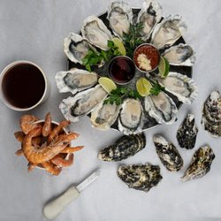 Pirates Kitchen - Oysters Served with Cocktail sauce Horseradish Mignonette