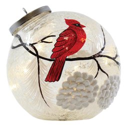 Snowy Cardinal Tabletop Ornament. This gorgeous decoration lights up to brighten your home all season long.