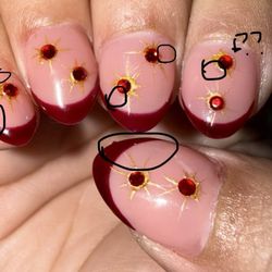 Lucy & Kelly’s Nail Salon - Stars missing the sides and where the goop of glue was left behind. Plus the two stars that are misaligned and instead ontop of each other.