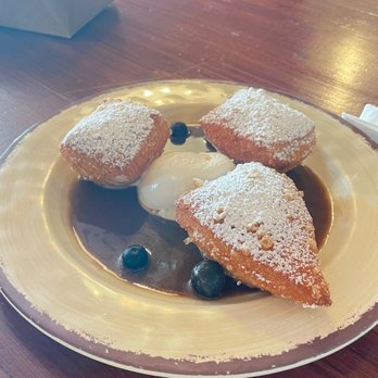 Two Hommés - Beignets with an espresso sauce - African Near Me - Inglewood, California Two Hommés - Beignets with an espresso sauce - African Near Me - Inglewood, California