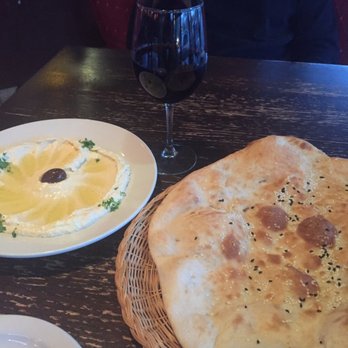 Arabesque - Hummus appetizer was amazing! Fresh warm bread and creamy hummus topped with olive oil. - Mediterranean Near Me - Columbia, South Carolina Arabesque - Hummus appetizer was amazing! Fresh warm bread and creamy hummus topped with olive oil. - Mediterranean Near Me - Columbia, South Carolina