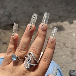 Fashion Lovely Nails - only had them for 2 days !!!!! and i have stones missing and my nails are lifting.