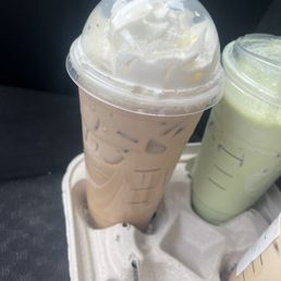 two cups of iced coffee in a styrofoam container two cups of iced coffee in a styrofoam container