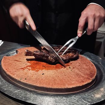 El Gaucho - The GM slicing our steak - Steakhouses Near Me - Seattle, Washington El Gaucho - The GM slicing our steak - Steakhouses Near Me - Seattle, Washington