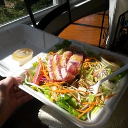 Seared Ahi Tuna salad with peanut cilantro dressing, sesame seeds and two kinds of cabbage. Nine thumbs up. Seared Ahi Tuna salad with peanut cilantro dressing, sesame seeds and two kinds of cabbage. Nine thumbs up.
