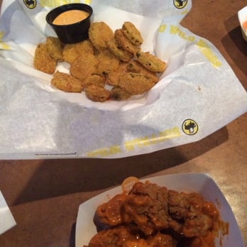 Buffalo Wild Wings - Fried pickles with spicy garlic wings - American Near Me - Henderson, Nevada