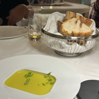 Estiatorio Milos - Complimentary bread w/ olive oil - Venues & Event Spaces Near Me - Toronto, Ontario Estiatorio Milos - Complimentary bread w/ olive oil - Venues & Event Spaces Near Me - Toronto, Ontario