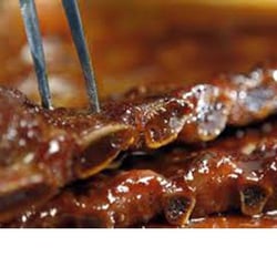 Cherries BBQ Pit - Slow smoked Saint Louis Ribs over local cherry wood.  A taste you cannot find anywhere else. $25.00 with 4 side dishes