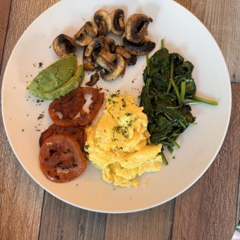 The Cafe Viento - Buenos Dias breakfast- two eggs, your way, wilted, spinach, grilled tomato, sautéed mushrooms, and avocado. - Waffles Near Me - Key West, Florida The Cafe Viento - Buenos Dias breakfast- two eggs, your way, wilted, spinach, grilled tomato, sautéed mushrooms, and avocado. - Waffles Near Me - Key West, Florida