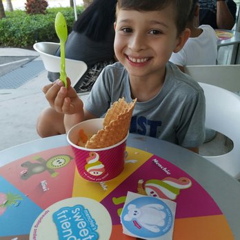 Menchies - He loveds his Menchie's!! Too many toppings to choose from, yet he manages to get most of them! - Ice Cream & Frozen Yogurt Near Me - Miami, Florida Menchies - He loveds his Menchie's!! Too many toppings to choose from, yet he manages to get most of them! - Ice Cream & Frozen Yogurt Near Me - Miami, Florida
