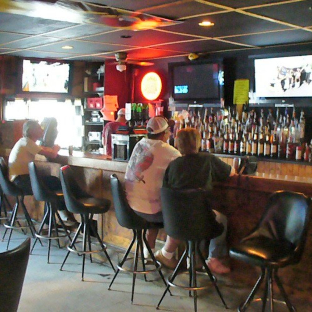 Dingus - a group of people sitting at a bar - Bars Near Me - Knoxville, Iowa Dingus - a group of people sitting at a bar - Bars Near Me - Knoxville, Iowa