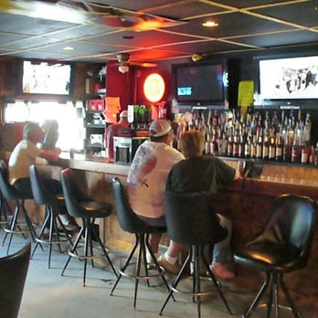 Dingus - a group of people sitting at a bar - Bars Near Me - Knoxville, Iowa