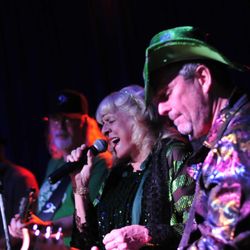 Jamie (bar owner) singing a tune with Diva Rocks