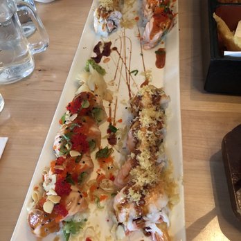 Jaku North - Almond Joy Roll & Crunch Munch Roll - salmon tasted weird, but looks pretty - Sushi Bars Near Me - Grand Rapids, Michigan Jaku North - Almond Joy Roll & Crunch Munch Roll - salmon tasted weird, but looks pretty - Sushi Bars Near Me - Grand Rapids, Michigan