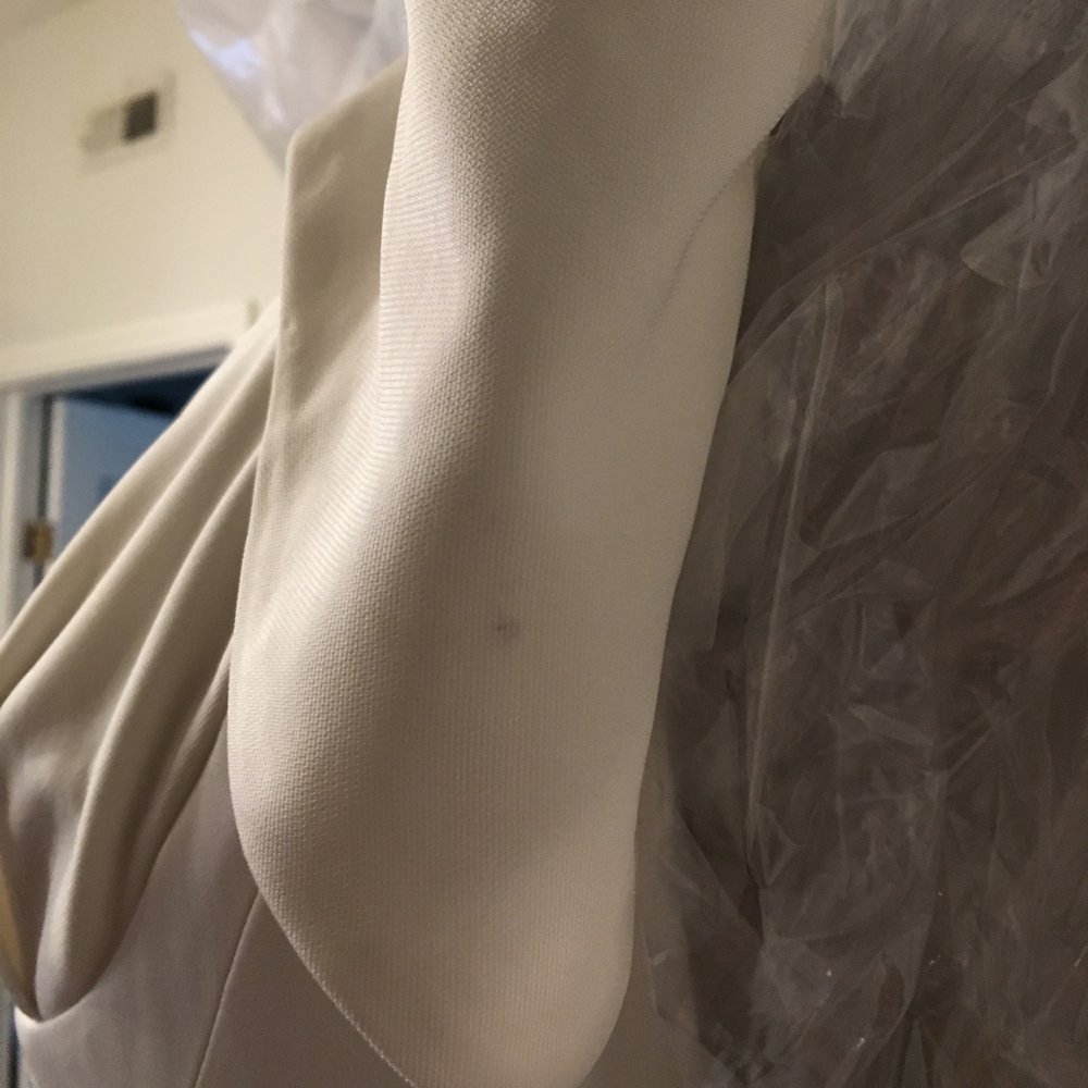 Fame Cleaners - Weird black mark on the sleeve of my wedding dress that was made by Fame Cleaners. - Sewing & Alterations Near Me - Chicago, Illinois Fame Cleaners - Weird black mark on the sleeve of my wedding dress that was made by Fame Cleaners. - Sewing & Alterations Near Me - Chicago, Illinois