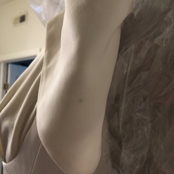 Fame Cleaners - Weird black mark on the sleeve of my wedding dress that was made by Fame Cleaners. - Sewing & Alterations Near Me - Chicago, Illinois