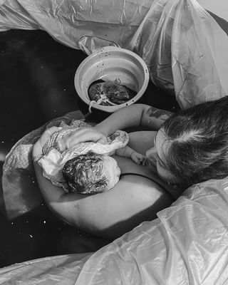 Water Birth - The theory behind water birth is simple: the birthing mother births her baby into an environment that is similar to the warm fluid protected space of the womb. It’s usually done a bathtub or birth pool filled with warm water.
The goal of using water during the birth process is to increase the comfort, peace, and relaxation of the mother. Water can be used at a form of pain management.  Baby’’s born in water as less traumatized by the birthing process.