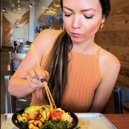 Enjoying my go to rice/salad mix tuna/salmon bowl.