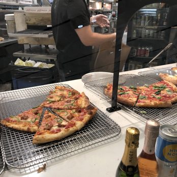 Andy’s Pizza - Tysons - A view of Margherita pizza and adult beverages. - Pizza Near Me - McLean, Virginia