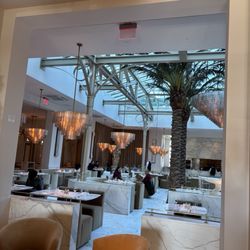 The Palm Court at RH San Francisco - Inside restaurant, beautiful relaxing seating area.