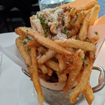 Ostra - Parmesan truffle fries - Seafood Near Me - Boston, Massachusetts Ostra - Parmesan truffle fries - Seafood Near Me - Boston, Massachusetts