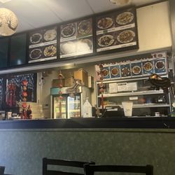 Dragon Express - Interior of the restaurant . Small but a couple chairs to enjoy your food.