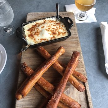 Heist Brewery - Beer cheese with pretzels and the Pilsner - New American Near Me - Charlotte, North Carolina Heist Brewery - Beer cheese with pretzels and the Pilsner - New American Near Me - Charlotte, North Carolina