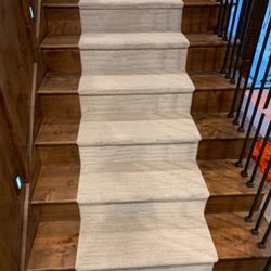 Millard Flooring - Capped steps and bound on both ends.