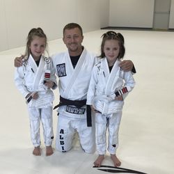 Overcome Brazilian Jiu Jitsu School - My girl's always looking forward to getting their next stripe with all their BJJ friends!