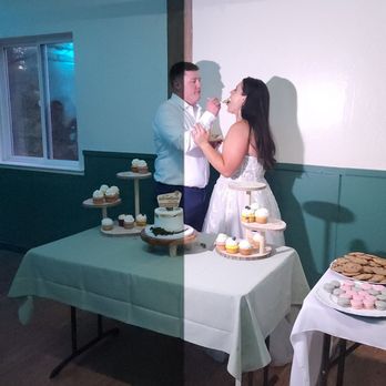Camp We Ch Me - The groom feeding the bride wedding cake - Venues & Event Spaces Near Me - Reno, Nevada