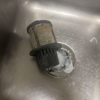 Heritage at Deer Valley - Dirty dishwasher filter. With roaches. - Apartments Near Me - Phoenix, Arizona