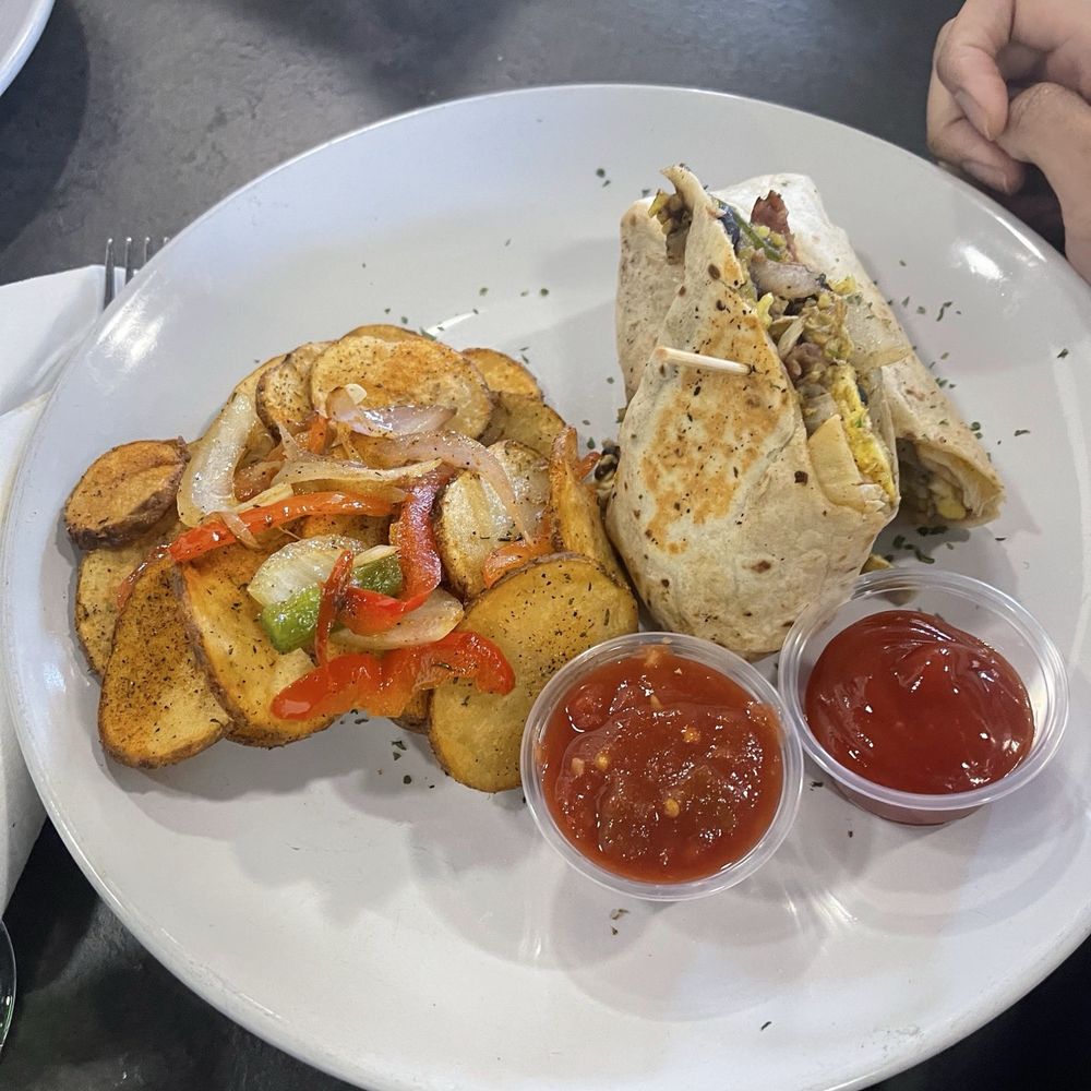 Poach Social - SAUSAGE EGG BREAKFAST BURRITO - Breakfast & Brunch Near Me - Atlanta, Georgia